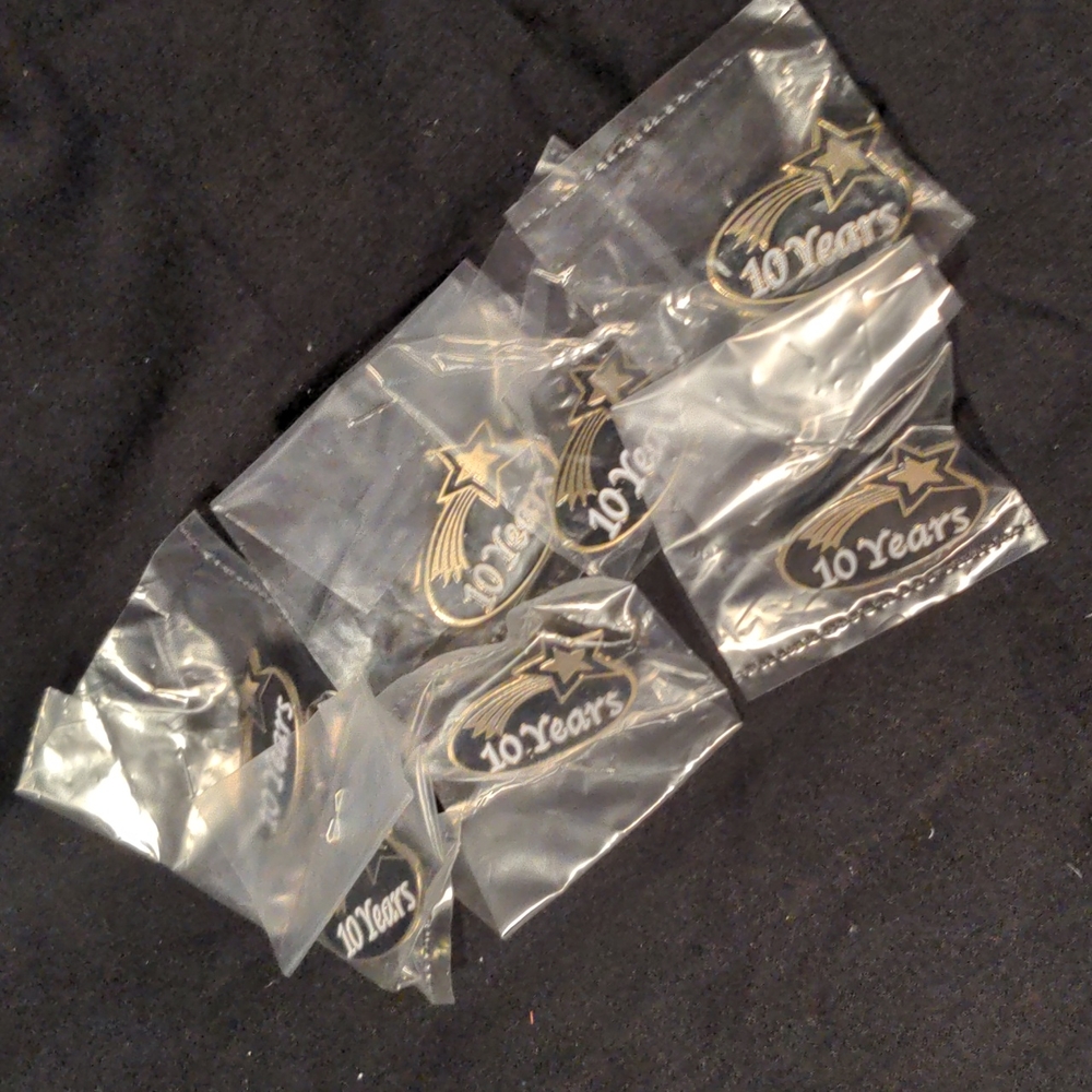 Bundle of 7 Crown Awards Ten Years Pin